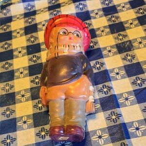 Vintage Figurine with Red Hat and Gray Outfit